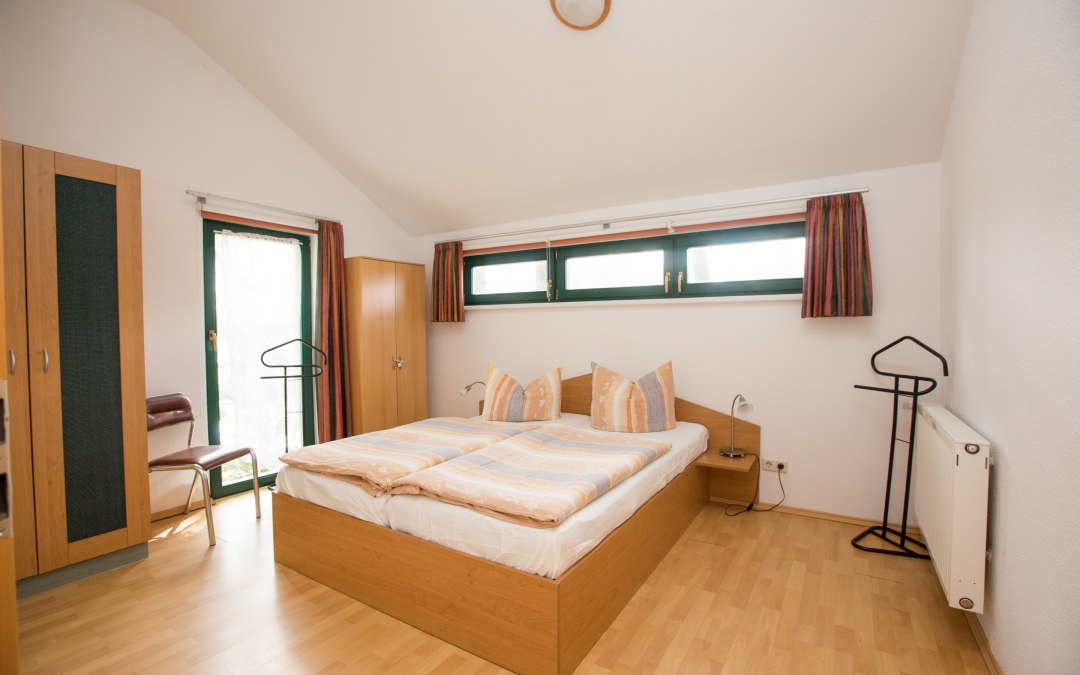 Slaapkamer in het vakantiehuis Waldschneise, © Ferienkontor