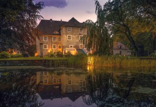 De waterburcht van Mellenthin bij schemering, © Wasserschloss Mellenthin